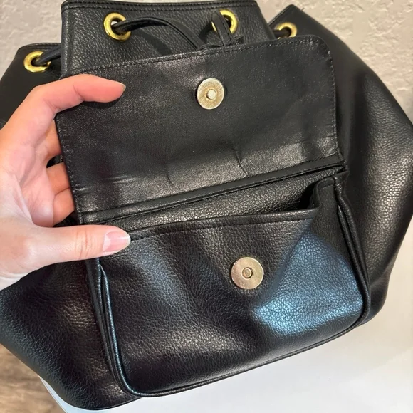 MCM Black Leather Backpack with Gold Accents - Picture 10 of 11